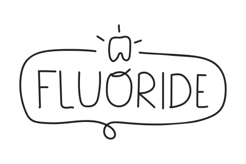 Uśmiechnięty ząb otoczony napisem "FLUORIDE". Aminofluorek to klucz do zdrowych zębów.
