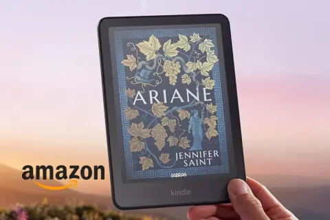 Un Kindle affiche la couverture du livre "Ariane" de Jennifer Saint. Un bon prix livre Kindle pour découvrir cette histoire.