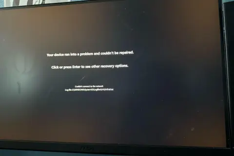 Ekran komputera z komunikatem błędu "Your device ran into a problem and couldn't be repaired.