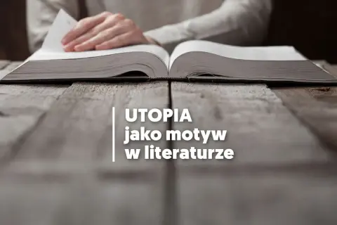 Otwarta księga na drewnianym stole, a na niej tekst: "UTOPIA jako motyw w literaturze". Czytanie o tym, utopia co to, otwiera drzwi do wyobraźni.