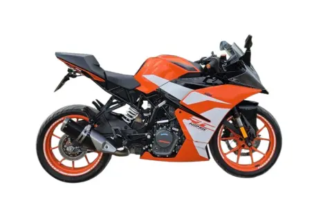 Pomarańczowy KTM RC 125, gotowy do osiągnięcia swojej v max. Sportowy wygląd i dynamiczna sylwetka.