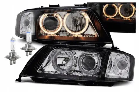 Nowe lampy do Audi A6 C5 z ringami i żarówkami.