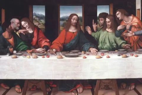 Ostatnia wieczerza w Mediolanie. Jezus i apostołowie przy stole, atmosfera napięcia i smutku.