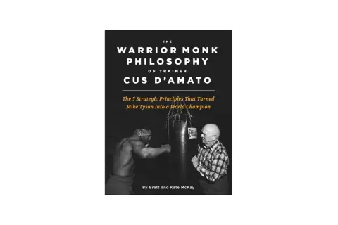 Book cover: "The Warrior Monk Philosophy of Trainer Cus D'Amato," showing a young Mike Tyson training with Cus D'Amato.