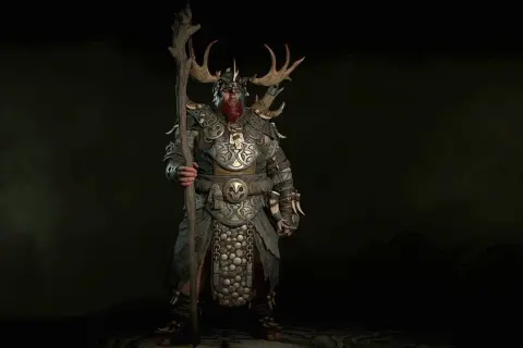 Potężny druid z Diablo 4, z porożem na hełmie i kosturem, gotowy do walki. Idealny diablo 4 druid build pl.