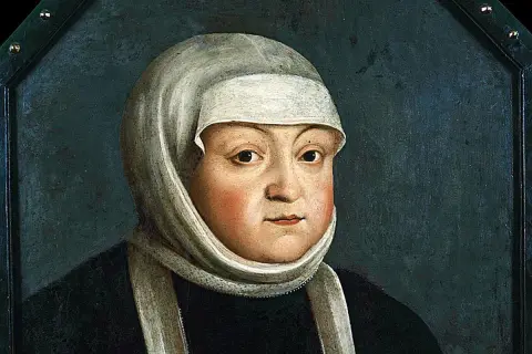 Portret królowej Bony w białym czepcu i czarnej sukni.