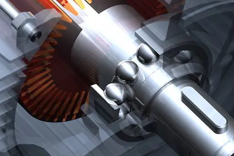 Mechanizm z zębatkami i kulkami łożyskowymi. Centralna oś obraca się, napędzając zębatki.
