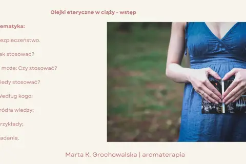 Kobieta w ciąży trzyma USG, tworząc serce dłońmi. Temat: olejki eteryczne w ciąży – bezpieczeństwo, stosowanie i źródła wiedzy.