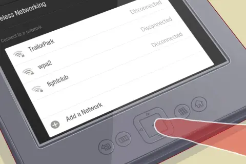 Un doigt appuie sur un bouton d'un appareil affichant les réseaux Wi-Fi disponibles, prêt à envoyer vers Kindle.