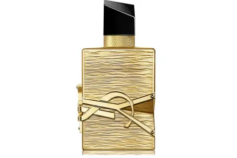 Złoty flakon perfum Libre 100ml z czarną nakrętką i złotym logo YSL.
