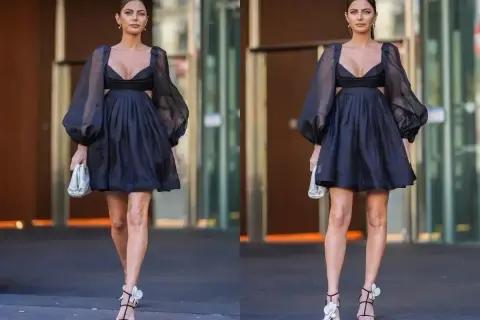 Elegancka czarna sukienka z bufiastymi rękawami i wycięciami. Idealna stylizacja na 40 urodziny, by poczuć się wyjątkowo.