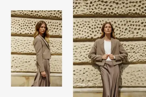 Elegancka beżowa marynarka męska w stylizacjach z jedwabną spódnicą. Klasyka i nowoczesność w jednym.