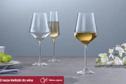 Eleganckie kieliszki do wina, jeden z winem, drugi pusty, trzeci z szampanem. Zastanawiasz się, jaką pojemność ma kieliszek?