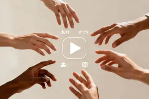 Hands reach for a play button, symbolizing collaboration and the creation of a social media viral video through duet and stitch features.
