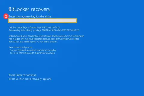 Ekran odzyskiwania BitLocker. Wpisz swój klucz odzyskiwania BitLocker, aby odblokować dysk.