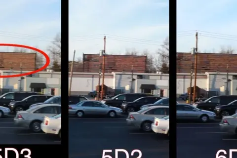 Comparaison des images : canon 6d mark ii vs 5d mark iii. Un parking avec des voitures et des bâtiments en arrière-plan.