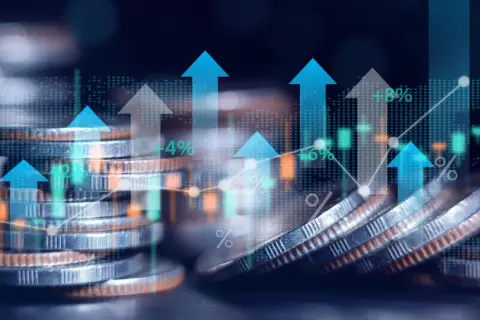 Wzrost finansowania samorządów terytorialnych: stosy monet, wykresy wzrostu i strzałki w górę ilustrują, jak Polska 2050 chce zwiększyć finansowanie samorządów terytorialnych.