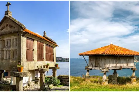 Dos hórreos, uno de piedra con cruz y otro de madera, se alzan sobre pilares en la costa de Asturias.