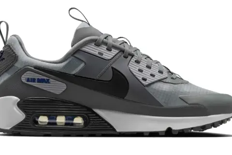 Szary but sportowy Nike Air Max Light z czarnym logo i widoczną poduszką powietrzną.