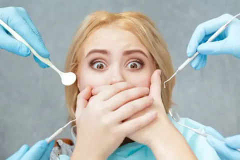 Jak wytrzymać u dentysty – skuteczne sposoby na stres i ból podczas wizyty