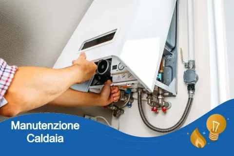 Tecnico controlla caldaia a condensazione. La revisione caldaia a condensazione ogni quanto è fondamentale per efficienza e sicurezza.