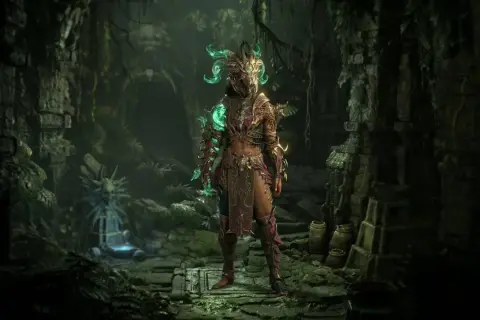 Postacie z Diablo 4 w zbroi z zielonymi, świecącymi elementami, stojące w ruinach świątyni.