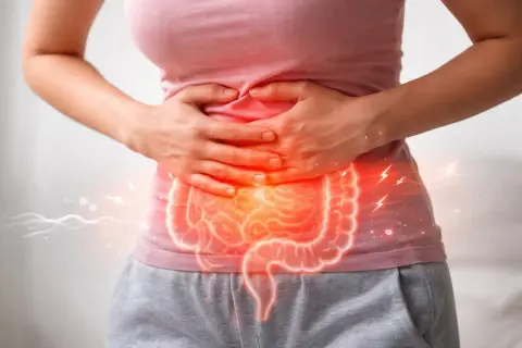 Dolore e tensione addominale con un'illustrazione luminosa dell'intestino.