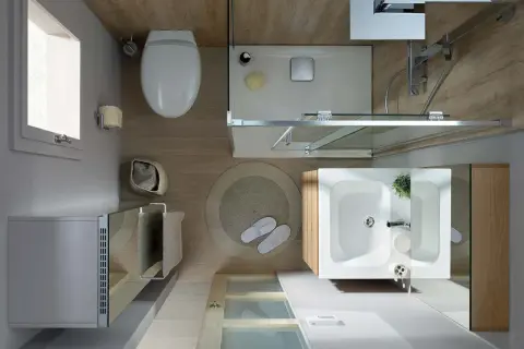Vue aérienne d'une salle de bain moderne et épurée. Toilette, douche, lavabo, et radiateur créent une ambiance salle de bain apaisante.