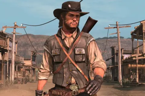 John Marston w kapeluszu i kamizelce, gotowy do akcji w miasteczku z Dzikiego Zachodu. Czekasz na Red Dead Redemption PS5?
