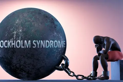 Syndrom sztokholmski: Dlaczego ofiara broni kata? Poznaj mechanizm.