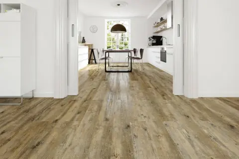 Un suelo de madera rústica que invita a cambiar el suelo de tu casa. Cocina y comedor modernos con luz natural.