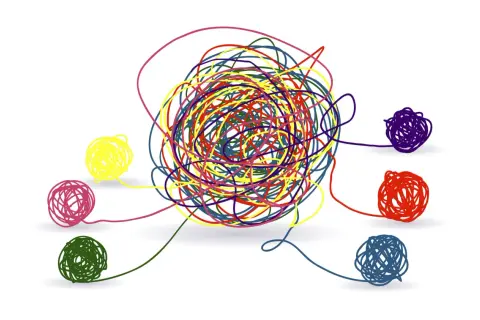 Un groviglio di fili colorati rappresenta la complessità della mente. Chi va dallo psicologo cerca di districare i propri pensieri, uno alla volta, per ritrovare serenità.