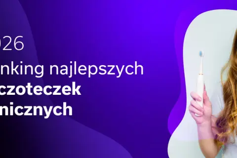 Kobieta z rudymi włosami trzyma białą szczoteczkę soniczną na tle tekstu "Ranking najlepszych szczoteczek sonicznych 2026".