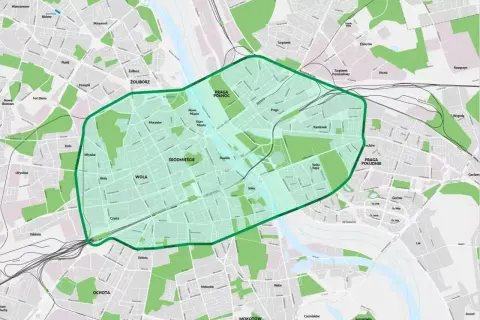 Mapa Warszawy z zaznaczoną zieloną obwódką: strefa czystego transportu obejmuje Śródmieście, Wola, Praga Północ i Południe.