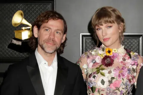 Aaron Dessner and Taylor Swift at the Grammys. Their collaboration on her songs has earned critical acclaim.