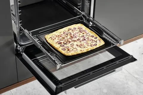 Kamień do pizzy czy warto? Odkryj jego zalety i zastosowanie