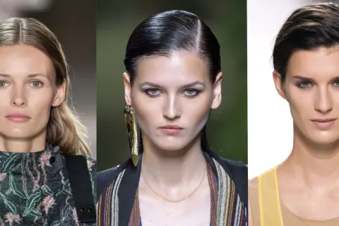 Trois mannequins aux regards intenses. La deuxième arbore un maquillage smoky eyes vert audacieux, accentuant ses yeux perçants.