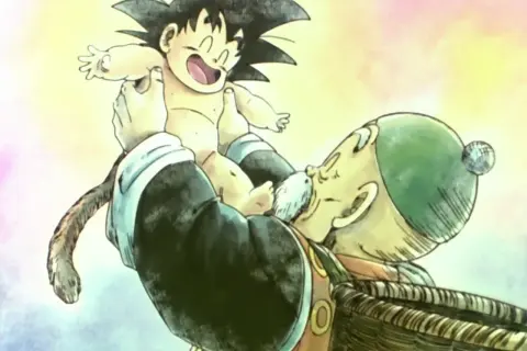 Opa Gohan hält den kleinen Son Gohan hoch. Der Junge lacht und sein Affenschwanz baumelt.