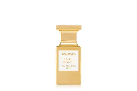 Złota butelka perfum Tom Ford Soleil Brûlant, emanująca ciepłem i luksusem.