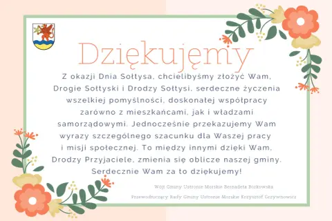 Wesoły dzień sołtysa! Podziękowania dla sołtysów za pracę i zaangażowanie. Kwiatowe ozdoby dodają uroku.