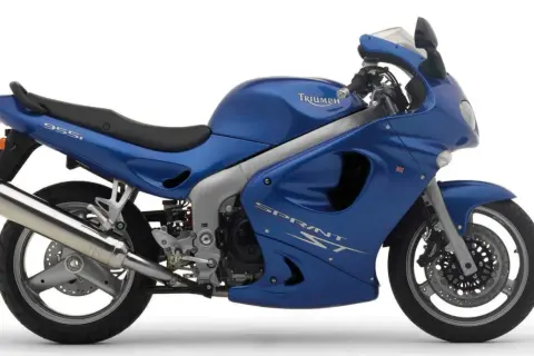 Niebieski motocykl turystyczny Triumph Sprint ST 955i gotowy na długie trasy.