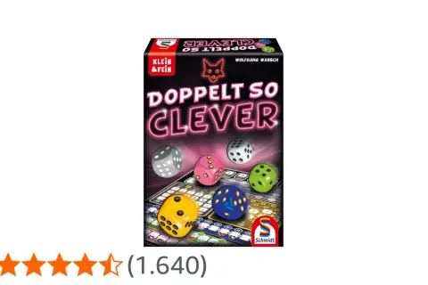 Brettspiel "Doppelt so clever" mit bunten Würfeln und Spielbrett. Die Anleitung ist Teil des Spiels.