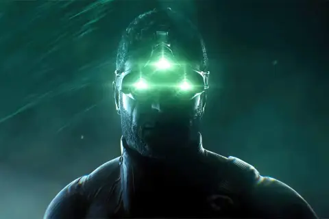 Sam Fisher w okularach z zielonymi światłami, gotowy do akcji w splinter cell remake.