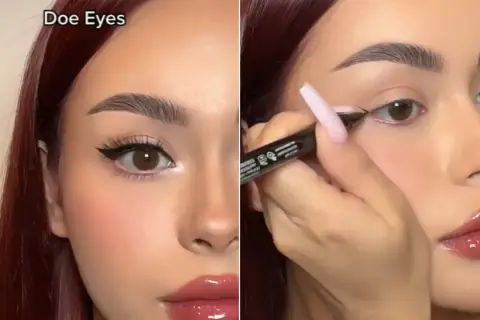 Kobieta z brązowymi włosami tworzy makijaż typu "doe eyes", podkreślając swoje duże, okrągłe oczy eyelinerem.