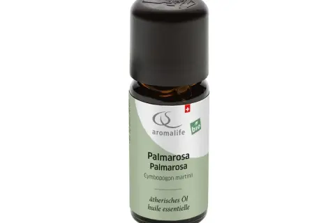 Kleine Flasche ätherisches Palmarosa Öl. Die **Palmarosa Wirkung Psyche** wird durch den Duft positiv beeinflusst.