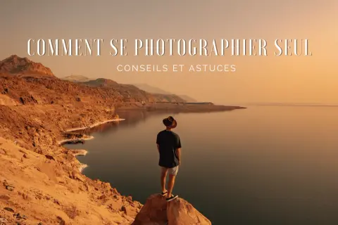 Homme seul au chapeau contemplant un paysage désertique et aquatique. Une excellente idée de photo à faire seul chez soi, avec des conseils et astuces.