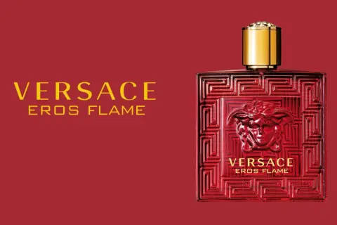 Flakon Versace Eros Flame 100ml w intensywnym czerwonym kolorze z greckim wzorem i złotą nakrętką.