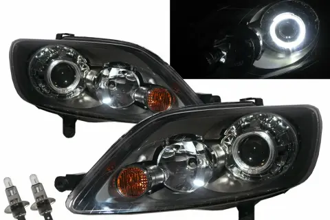 Reflektory do Golfa 5 z ringami LED, idealne do wymiany żarówki w przedniej części auta.
