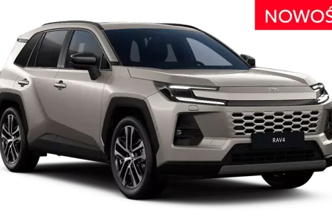 Nowy, beżowy Toyota RAV4 z nowoczesnym grillem i światłami LED. Czerwony napis "NOWOŚĆ" informuje o premierze.