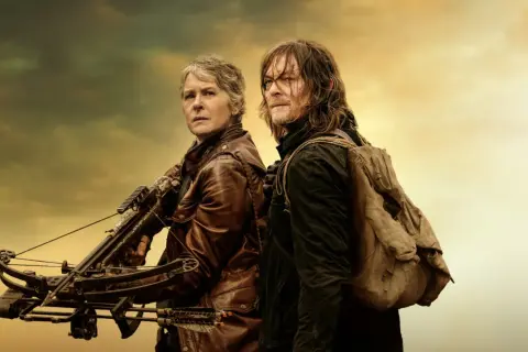 Carol i Daryl, bohaterowie seriali zombie, gotowi do walki z nieumarłymi. Ona z kuszą, on z plecakiem.